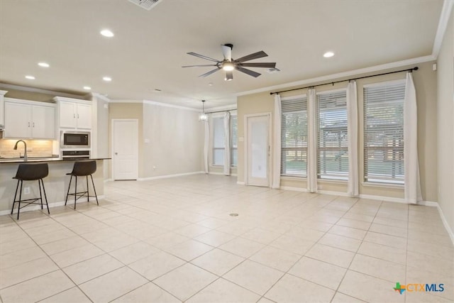 212 Lasata Ln, Belton, TX 76513 - living area with ornamental molding, recessed lighting, a ceiling fan, light tile patterned floors, and baseboards