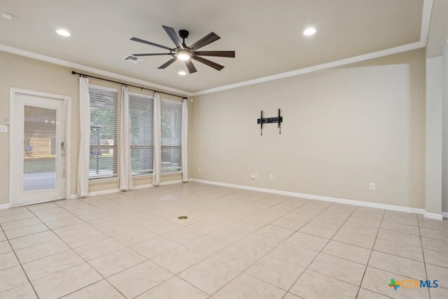 tiled empty room with ceiling fan and ornamental molding