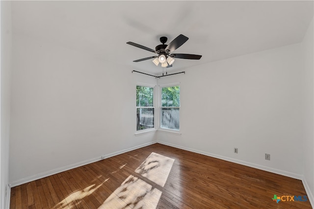 unfurnished room featuring hardwood / wood-style floors and ceiling fan