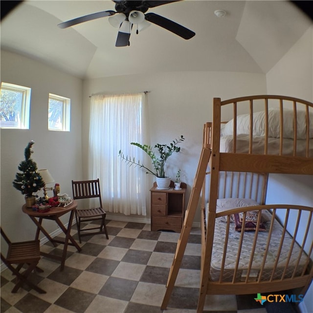 bedroom with vaulted ceiling and ceiling fan