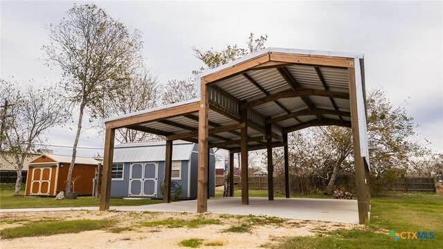 view of property's community featuring a shed