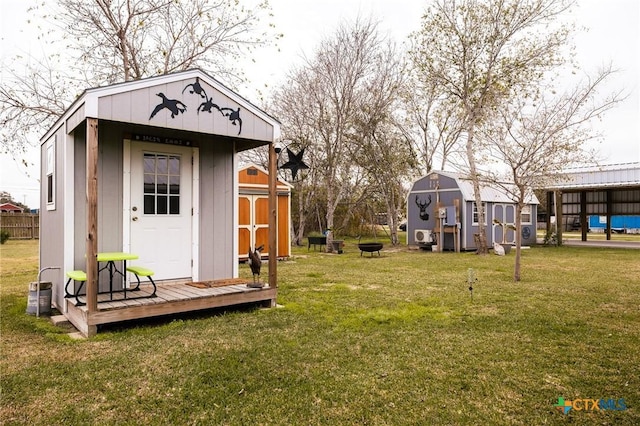 view of outbuilding with a lawn