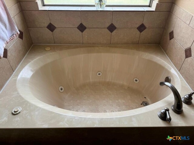 9604 Diana Dr, Killeen, TX 76542 - bathroom with a tub with jets