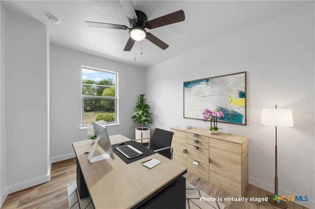 1005-1015 S 26th St, Temple, TX 76501 - office space featuring a ceiling fan, light wood finished floors, and baseboards