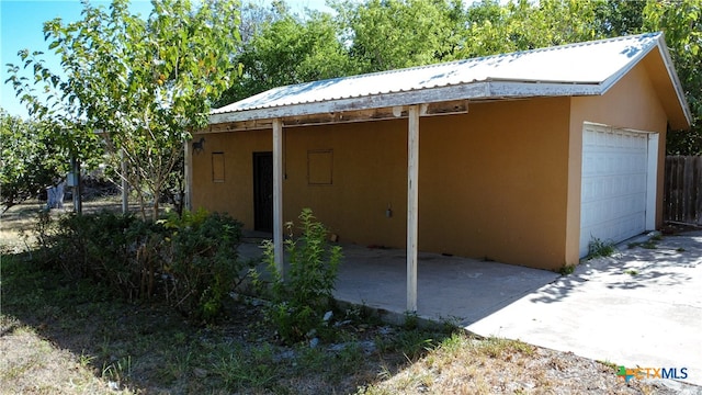 exterior space with a garage