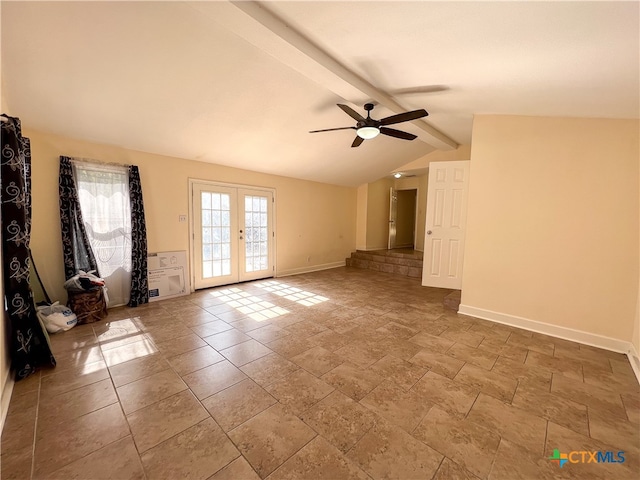 empty room featuring french doors, lofted ceiling with beams, and ceiling fan