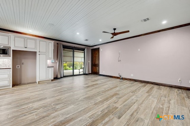 unfurnished living room featuring light wood-style floors, ornamental molding, baseboards, and ceiling fan