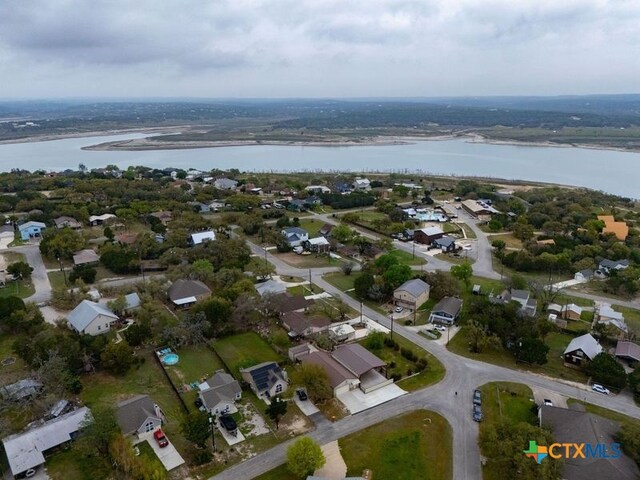 bird's eye view with a residential view and a water view