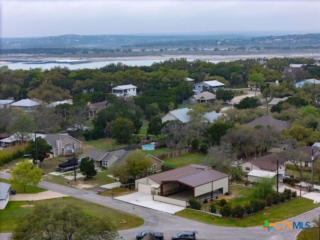 aerial view featuring a residential view and a water view