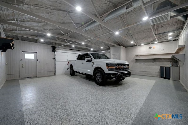 garage with visible vents