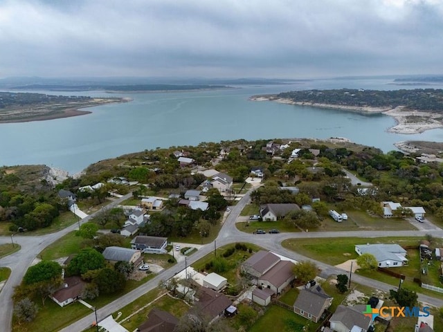 bird's eye view featuring a residential view and a water view