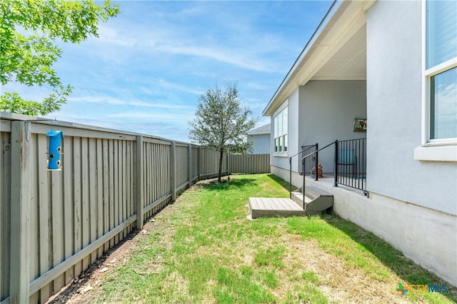 view of yard featuring a fenced backyard