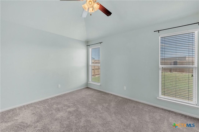 7810 Woodbury Dr, Temple, TX 76502 - spare room featuring carpet floors, a ceiling fan, baseboards, and vaulted ceiling