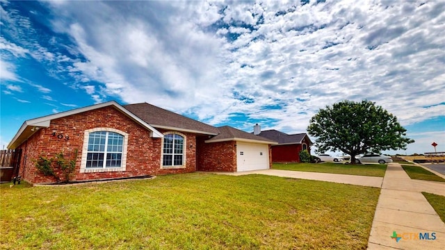403 Ali Dr, Killeen, TX 76542 - ranch-style home featuring driveway, a garage, a front yard, and brick siding