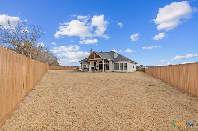 back of house with a patio area