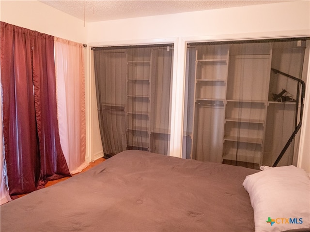 bedroom featuring a textured ceiling