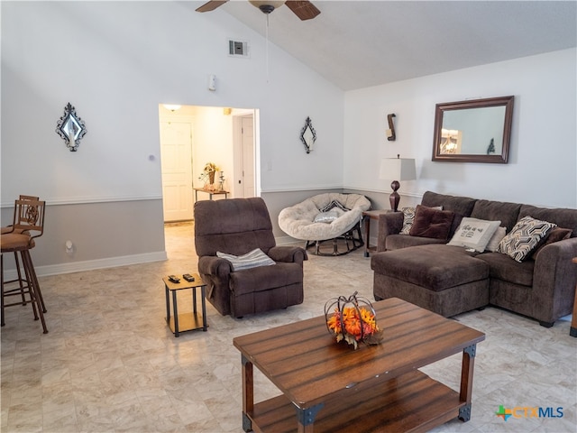 living room with high vaulted ceiling and ceiling fan