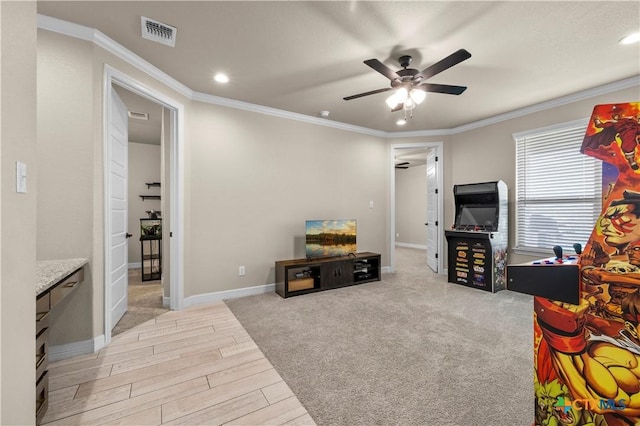 813 Reston Rd, Temple, TX 76502 - living area featuring a ceiling fan, light wood-style floors, ornamental molding, and recessed lighting