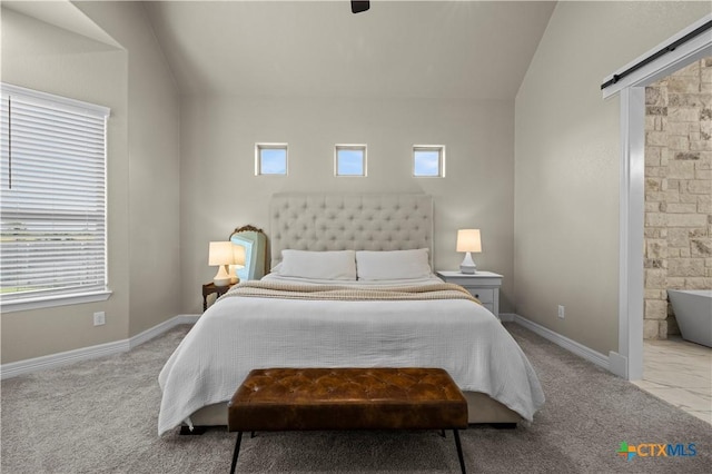813 Reston Rd, Temple, TX 76502 - carpeted bedroom with lofted ceiling and ensuite bathroom