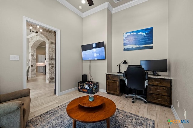 813 Reston Rd, Temple, TX 76502 - office with arched walkways, light wood-style flooring, ornamental molding, and a ceiling fan