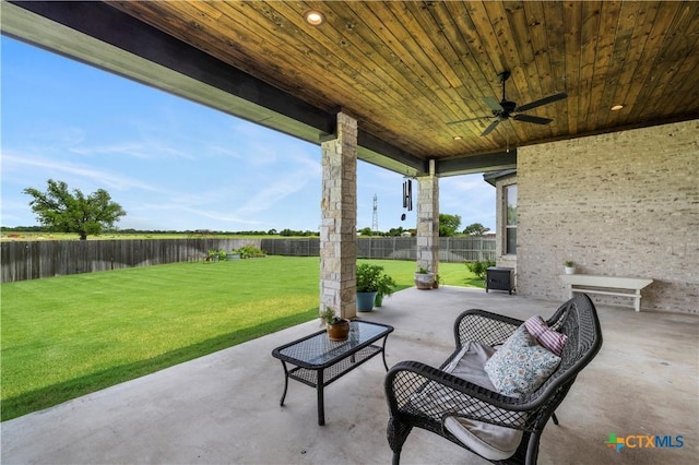 813 Reston Rd, Temple, TX 76502 - fenced backyard with a ceiling fan and a patio area