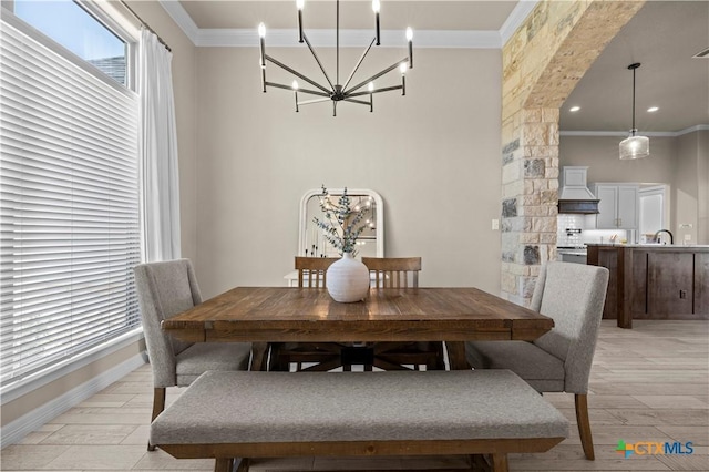813 Reston Rd, Temple, TX 76502 - dining area with crown molding and a chandelier