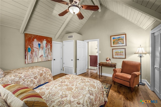 bedroom with wood ceiling, ceiling fan, beam ceiling, and hardwood / wood-style floors