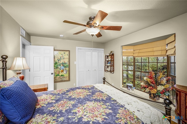 bedroom with a closet and ceiling fan