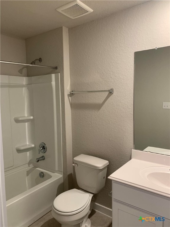 full bathroom with toilet, vanity, and shower / bathtub combination