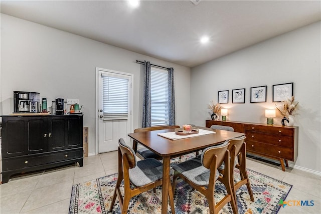 dining room featuring light tile patterned floors