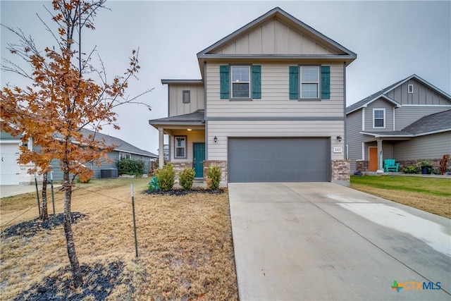 view of front of house with a garage and a front yard