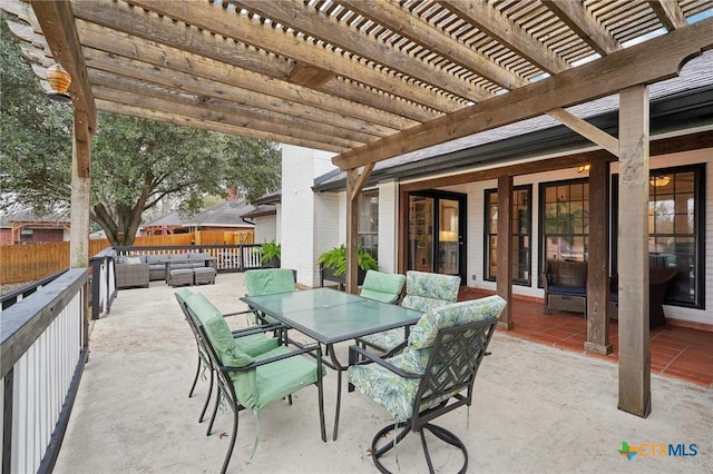 view of patio / terrace with an outdoor living space and a pergola