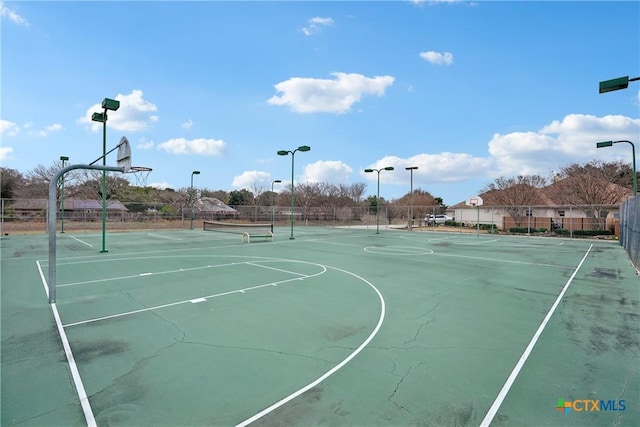 view of basketball court with tennis court