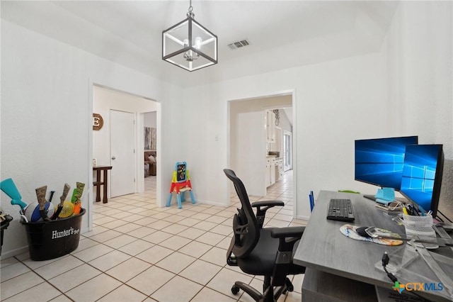 home office featuring a chandelier and light tile patterned floors