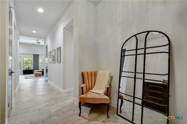 hallway featuring french doors and light hardwood / wood-style flooring