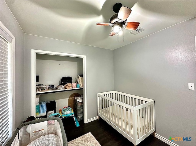 209 Roanoke Dr, Victoria, TX 77904 - bedroom with wood finished floors and a ceiling fan