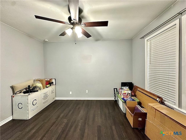 209 Roanoke Dr, Victoria, TX 77904 - miscellaneous room featuring dark wood-type flooring and a ceiling fan