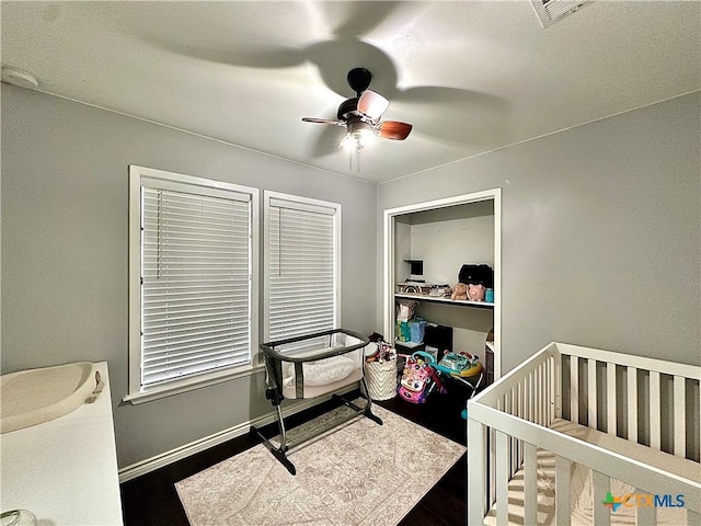 209 Roanoke Dr, Victoria, TX 77904 - bedroom featuring wood finished floors and a ceiling fan