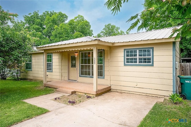 117 N 28th St, Gatesville, TX 76528 - view of front of home with metal roof and covered porch