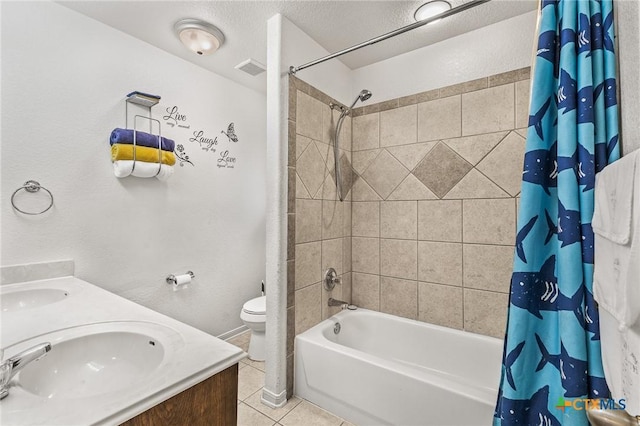 709 Aries Ave, Killeen, TX 76542 - full bath featuring shower / bath combo with shower curtain, double vanity, tile patterned floors, toilet, and baseboards