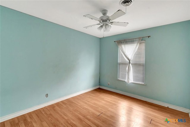 3106 Bobolink St, Victoria, TX 77901 - unfurnished room with wood finished floors and ceiling fan