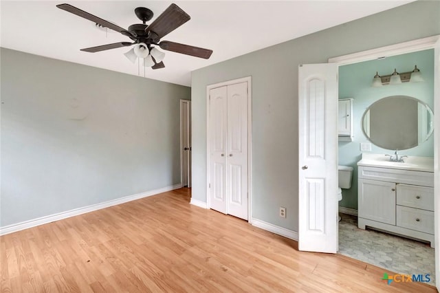 3106 Bobolink St, Victoria, TX 77901 - unfurnished bedroom featuring light wood finished floors, a closet, ceiling fan, and ensuite bathroom