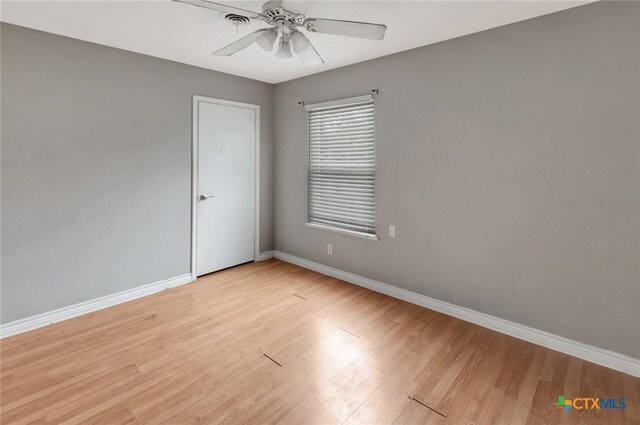 3106 Bobolink St, Victoria, TX 77901 - empty room with a ceiling fan and light wood-style floors