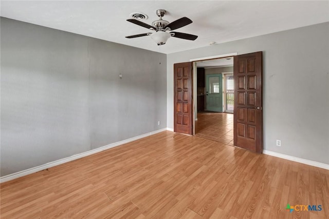 3106 Bobolink St, Victoria, TX 77901 - spare room with light wood-style floors and ceiling fan