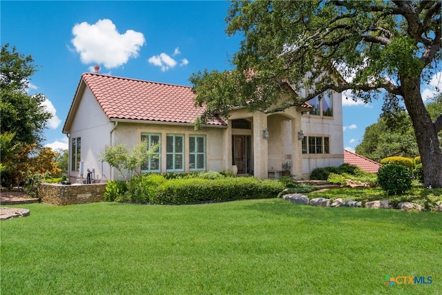 1280 Mystic Pkwy, Spring Branch, TX 78070 - rear view of house featuring stucco siding, a yard, a chimney, and a tile roof