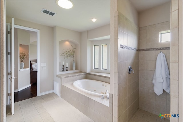 1280 Mystic Pkwy, Spring Branch, TX 78070 - full bath with a jetted tub, tile patterned flooring, ensuite bathroom, and tiled shower