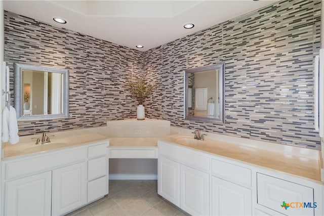 1280 Mystic Pkwy, Spring Branch, TX 78070 - bathroom featuring tile walls, decorative backsplash, tile patterned flooring, vanity, and recessed lighting