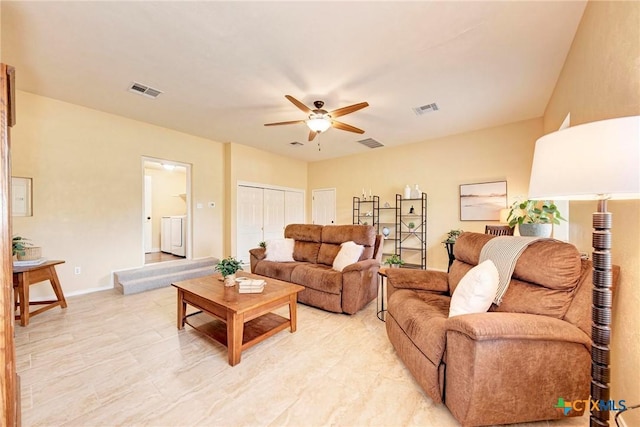 133 Ridgewood Cv, Georgetown, TX 78633 - living area featuring high vaulted ceiling, wood finished floors, plenty of natural light, a ceiling fan, and baseboards