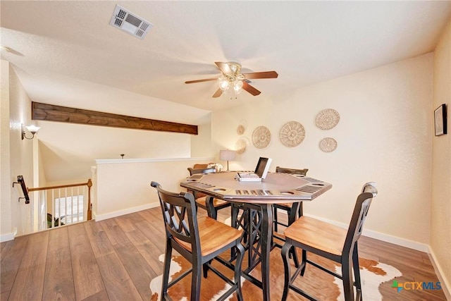 133 Ridgewood Cv, Georgetown, TX 78633 - living area featuring ceiling fan, wood finished floors, baseboards, high vaulted ceiling, and a fireplace