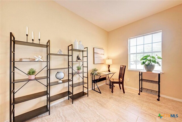 133 Ridgewood Cv, Georgetown, TX 78633 - sitting room featuring a desk and baseboards